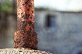 Close-up of rusty pole at the old sea marina pier